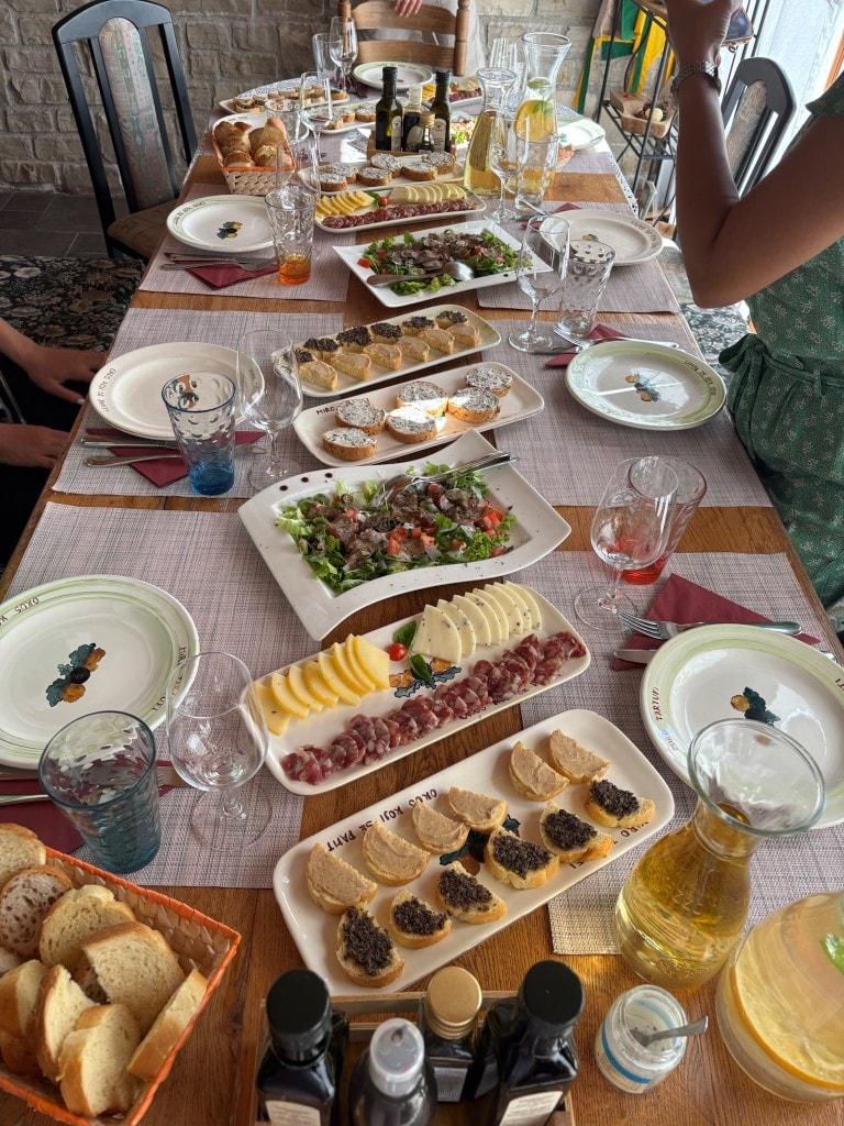 Miro Tartufi truffle tasting table with crostini, cheese, salad and wine, Istria Croatia